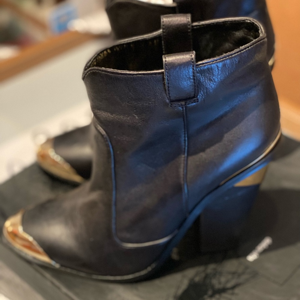 Black leather Dolce Vita fashion cowboy boots